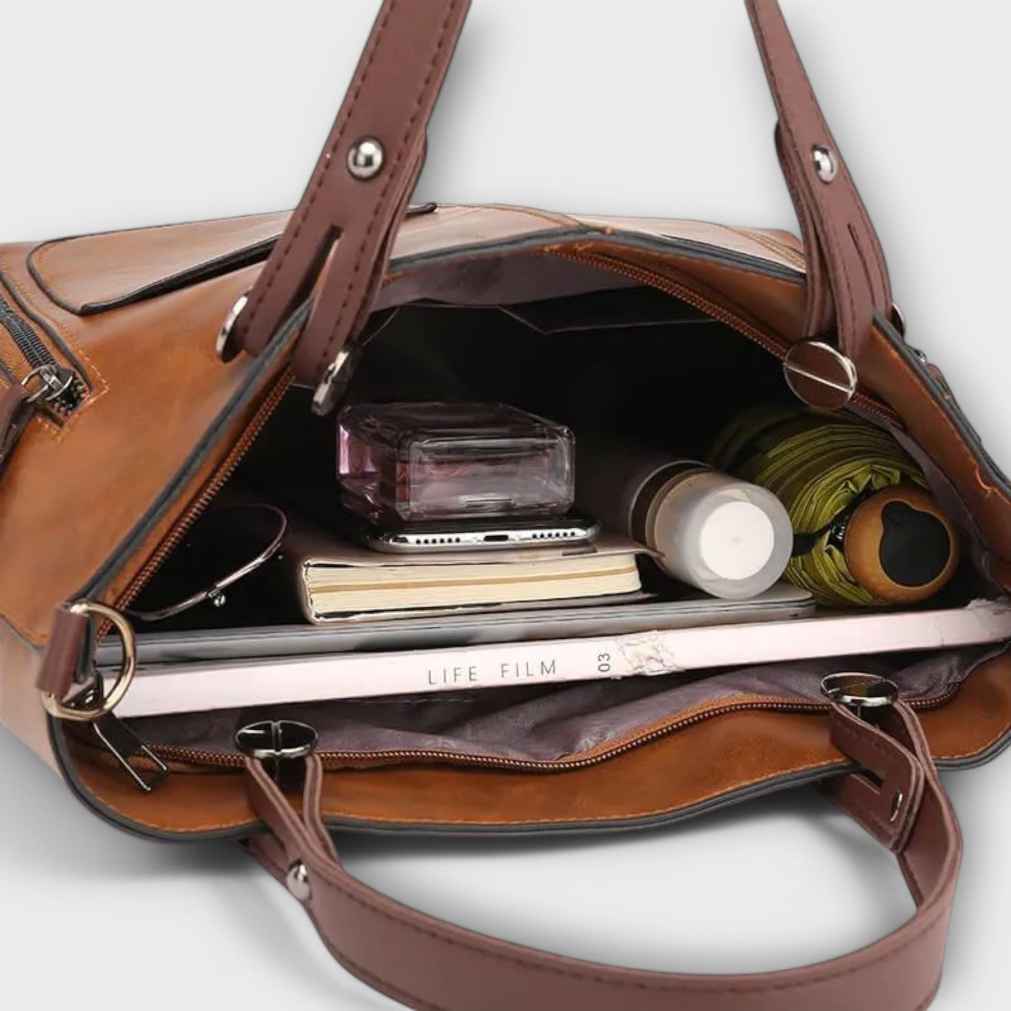 Maria. - Bolsa de couro elegante