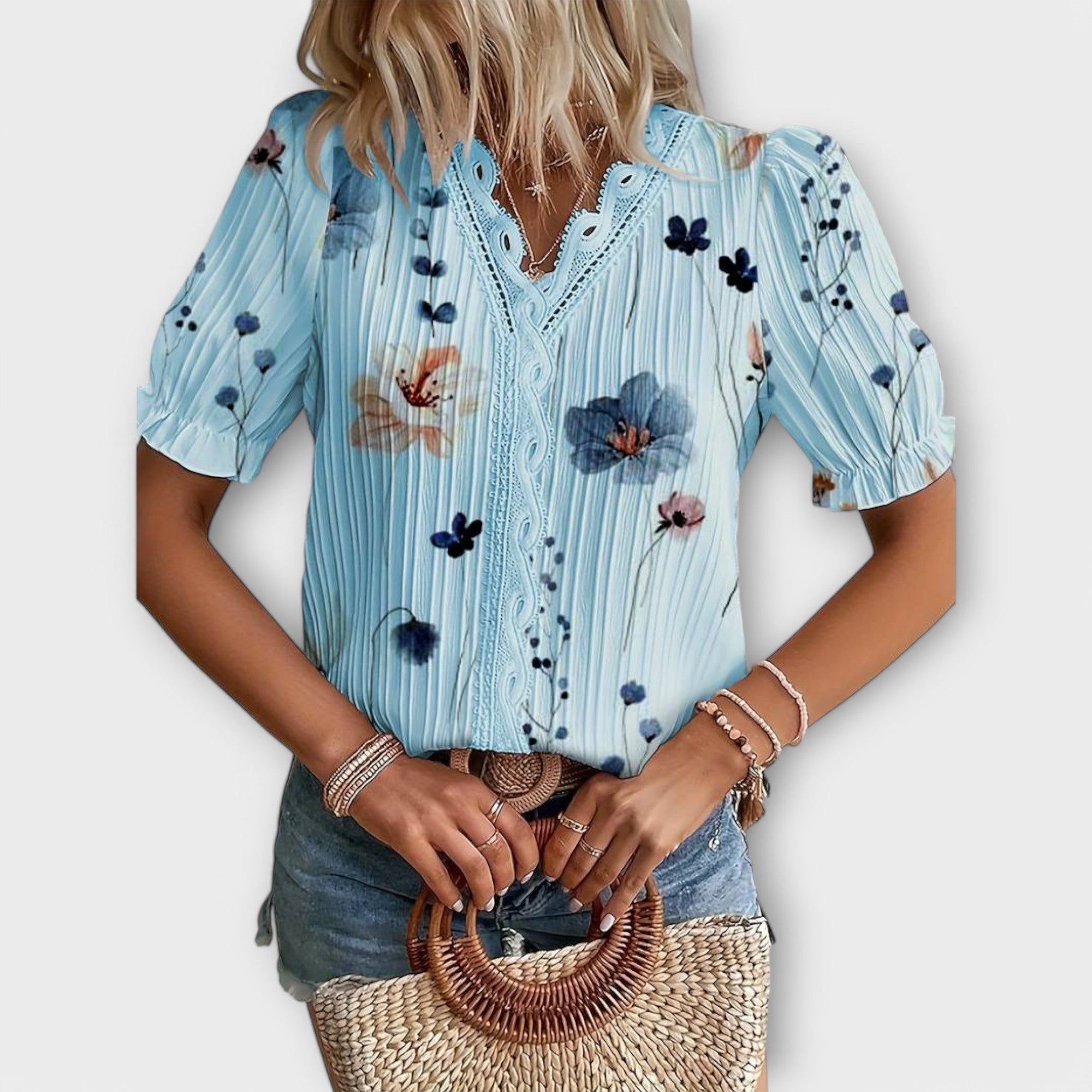 Bruna - Blusa elegante com um decote pontiagudo
