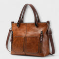 Maria. - Bolsa de couro elegante