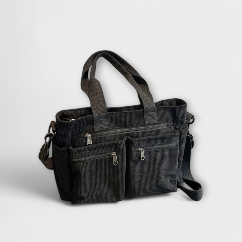 Maria. - Mala com vários bolsos